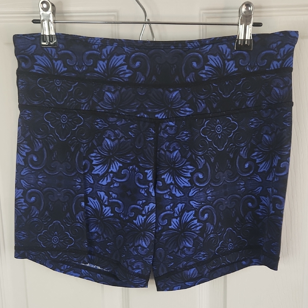 Blue and Black Athletic Shorts with Ornate Pattern